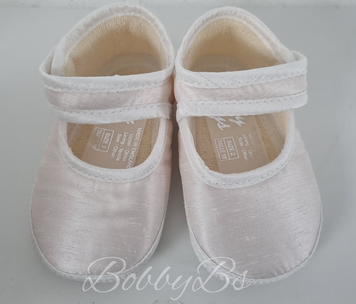 E006 - Ivory satin strap over shoe