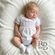 S26017 - Pink smocked romper